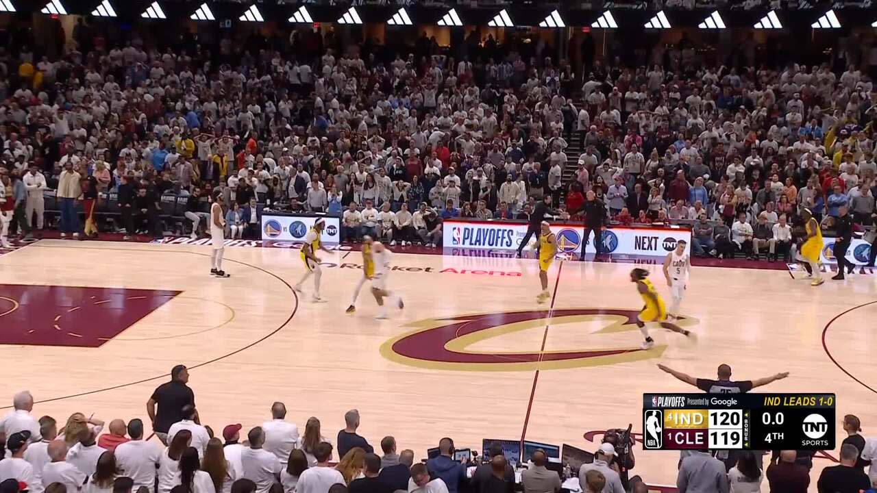 "Donovan Mitchell in action during NBA playoffs, scoring 48 points but struggling in the final minutes as the Cleveland Cavaliers collapse against their opponents."